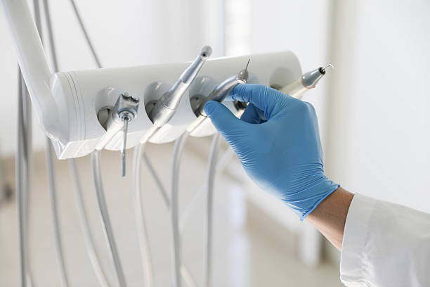 Professional Tooth Extraction technician working in Hartford, IL